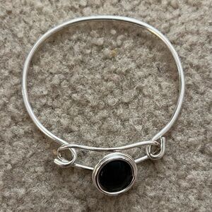 Silver and onyx bracelet.